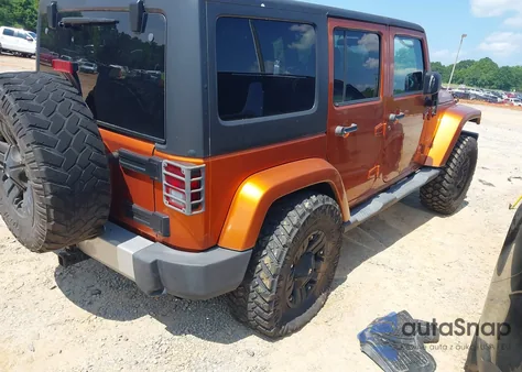 2011 Jeep Wrangler Unlimited Sahara из США, поврежденный, VIN 1J4BA5H15BL588327